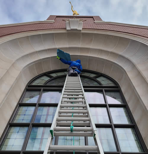 Cleaning The Windows On A Church